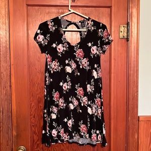 Mini dress with a floral print, and cut out back